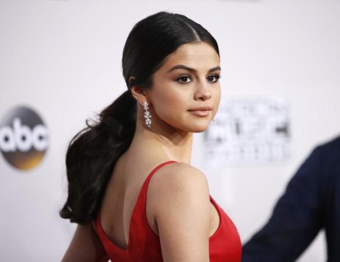 Recording artist Selena Gomez arrives at the 2016 American Music Awards in Los Angeles, California, U.S., November 20, 2016.