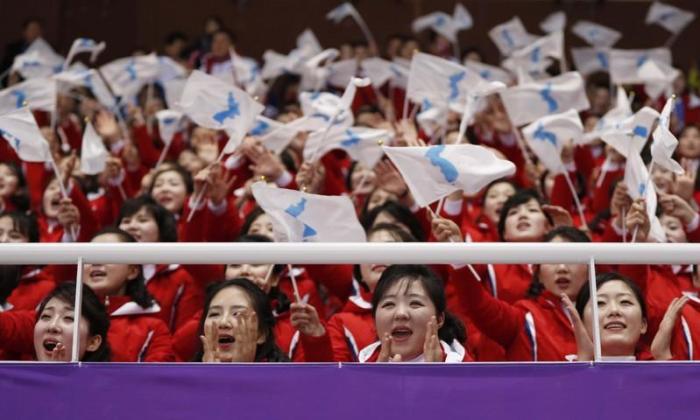 North Korean cheerleaders in action. Short Track Speed Skating Events, Pyeongchang 2018 Winter Olympics, Men's 1500m Competition, Gangneung Ice Arena, Gangneung, South Korea – February 10, 2018.