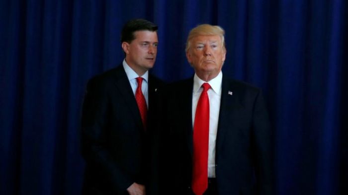 Former White House Staff Secretary Rob Porter (left) and President Donald Trump in an undated file photo.