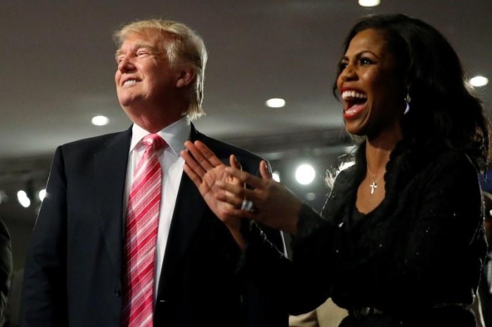 Republican presidential nominee Donald Trump and Omarosa Manigault (R) attend a church service, in Detroit, Michigan, U.S., September 3 2016.