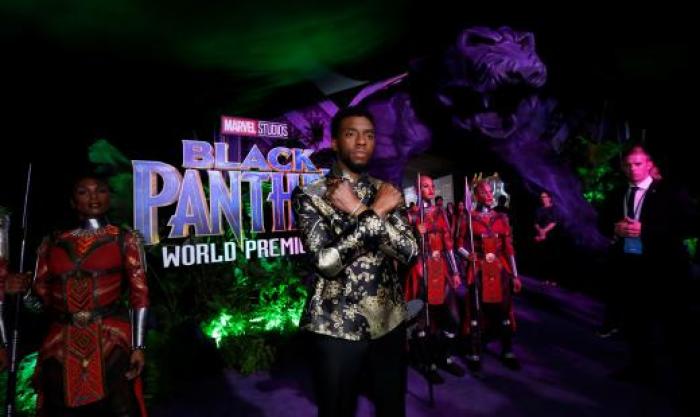 Cast member Chadwick Boseman poses at the premiere of 'Black Panther' in Los Angeles on January 30, 2018.
