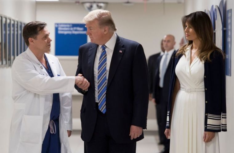 U.S. President Donald Trump and first lady Melania Trump visit with medical staff of Broward Health North Hospital in the wake of the shooting at Marjory Stoneman Douglas High School in Pompano Beach, Florida, U.S., February 16, 2018.