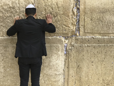 Rev. Samuel Rodriguez prays at the Western Wall in the Old City of Jerusalem in Israel on Feb. 18, 2019.