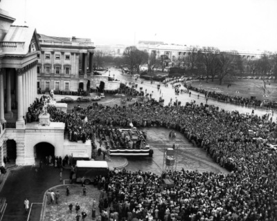 In an unprecedented act of Congress, Billy Graham is allowed to hold a service from the steps of the U.S. Capitol on Feb. 3, 1952. Thousands stood in the rain to hear him preach.