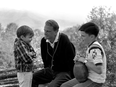 Billy Graham at home in Montreat, North Carolina, in 1965 with sons Nelson Edmond 'Ned' (left) and William 'Franklin' III (right).