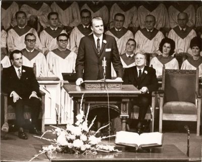 Evangelist Billy Graham preaches at First Baptist Dallas.