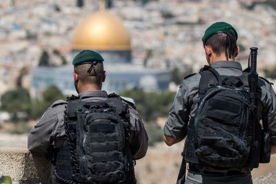 Border Police officers standing on the Mount of Olives facing the Temple Mount during an action in East Jerusalem, Israel, September 05, 2017.