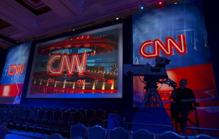 A CNN camera operator waits by his camera as the network prepares for the first democratic presidential candidate debate at the Wynn Hotel in Las Vegas, Nevada October 13, 2015.