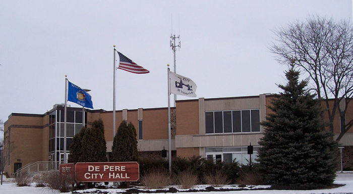 Flags wave in front of De Pere, Wisconsin's city hall on Feb. 11, 2007.