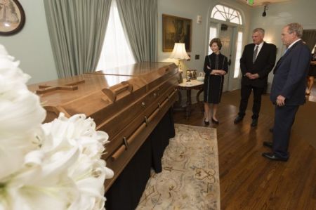 Former President George W. Bush and Laura Bush attend the lie in repose of Billy Graham in Charlotte, after a special visit with Franklin and Jane Graham at the Graham Family Homeplace on February 26, 2018.