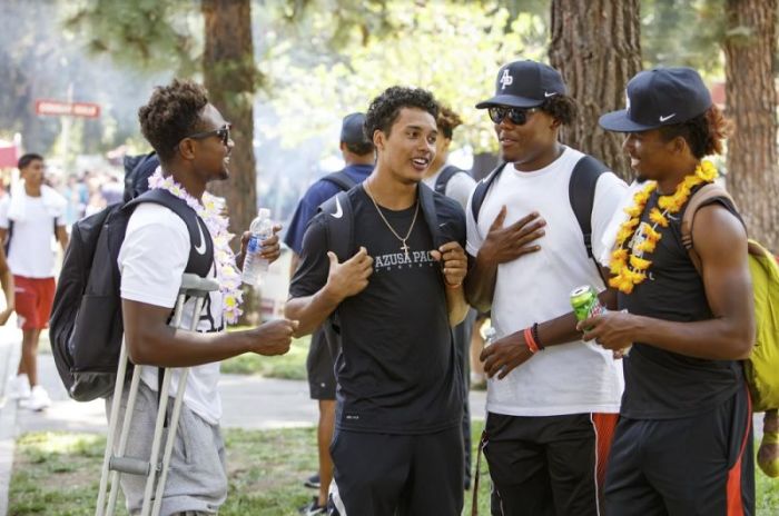 Students converse on the campus of Azusa Pacific University in Azusa, California in 2017.