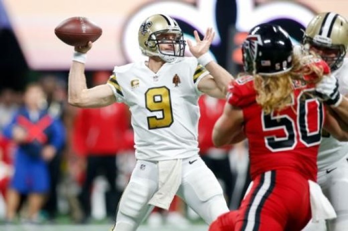 New Orleans Saints quarterback Drew Brees (9) throws a pass against the Atlanta Falcons in the first quarter at Mercedes-Benz Stadium, Dec. 7, 2017.