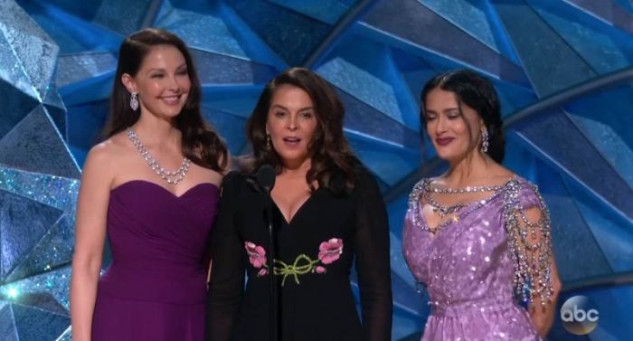 (L-R) Ashley Judd, Annabella Sciorra and Salma Hayek draw attention to the #MeToo movement at the Oscars, March 4, 2018.