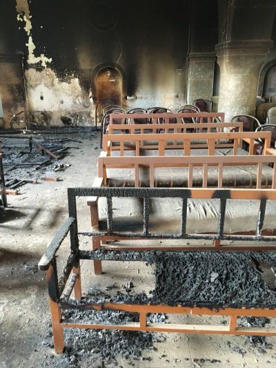 The inside of a church burned and damaged by the Islamic State in Karamles, Iraq.