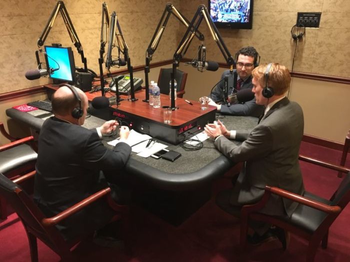 Forth District podcast with Sen. Chris Coons (left), Sen. James Lankford (right), and host Michael Wear (background, middle), March 6, 2018.