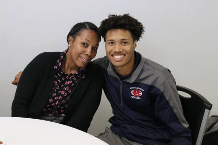 Davion Gates (R) poses in this recent photo with his mother at a school event.