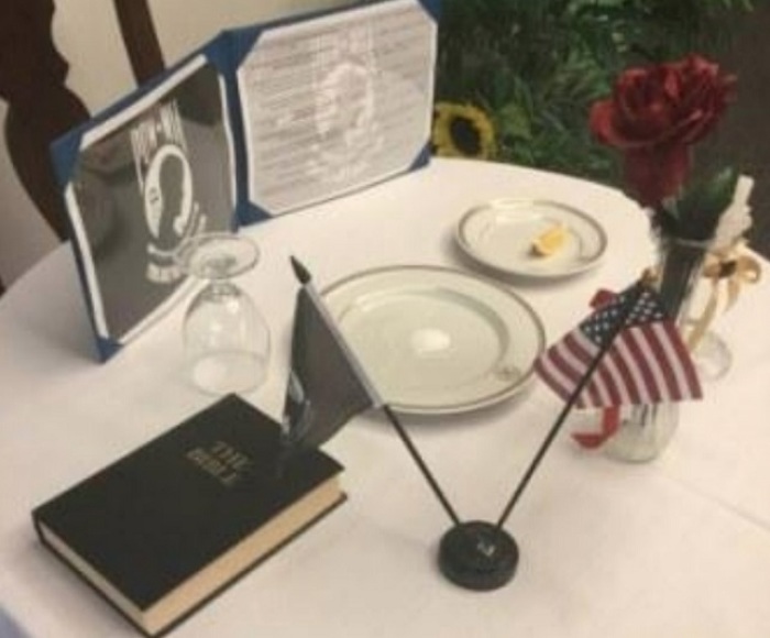 The Navy is investigating whether this 'Missing Man' display in Okinawa, Japan, violated the federal Constitution and Pentagon rules barring religious discrimination.