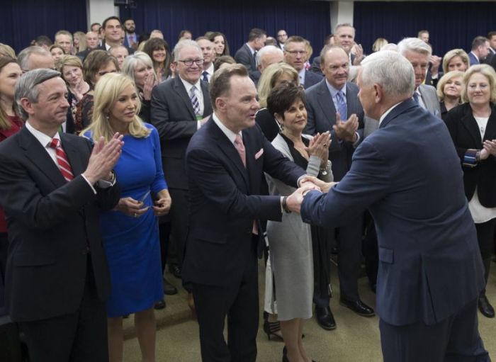 Vice President Mike Pence shakes the hand of Arkansas pastor and former Southern Baptist Convention president Ronnie Floyd during a meeting with dozens of Southern Baptist megachurch pastors and their wives in Washington, D.C. on April 11, 2018.