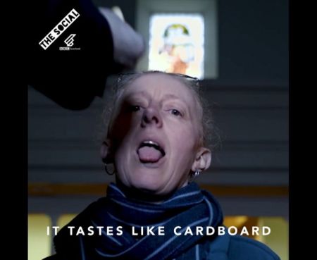 A woman receiving Holy Communion in a "BBC The Social" video on homophobia posted in April 2018.