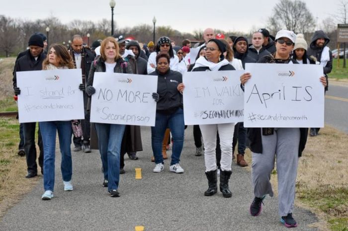 Participants take part in Prison Fellowship's Second Chance Month prayer walk in Washington, D.C. on April 7, 2018 to call on society to give ex-inmates who have served their time a 'second chance' upon re-entering society.