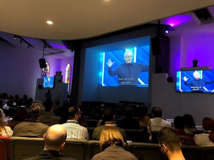 Willow Creek Community Church's founder Bill Hybels speaks to participants at a Global Leadership Summit in Lebanon via live broadcast.