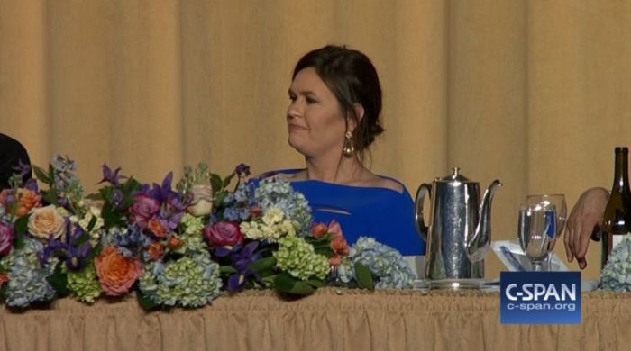 White House press secretary Sarah Sanders reacts at Michelle Wolf remarks at the 2018 White House Correspondents' Dinner in Washington D.C. on April 28, 2018.