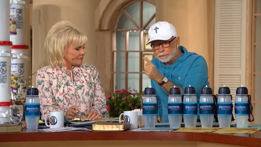 Jim Bakker (R) speaking on his "The Jim Bakker Show" program in Missouri on May 1, 2018.