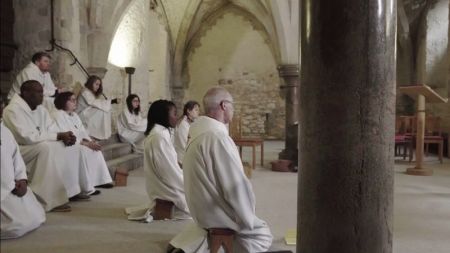 Archbishop of Canterbury Justin Welby (R) taking part of prayers in a video uploaded in February 2018.
