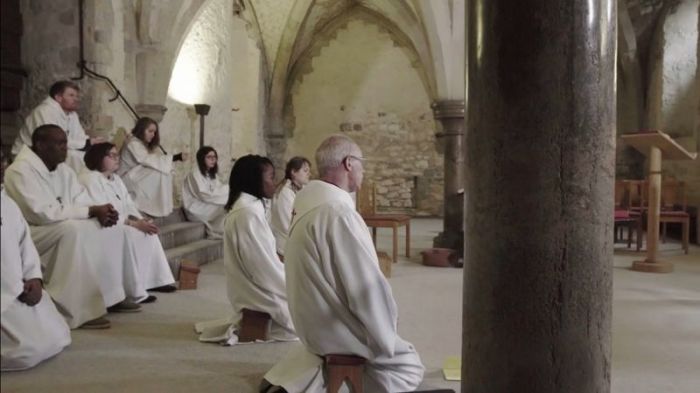 Archbishop of Canterbury Justin Welby (R) taking part of prayers in a video uploaded in February 2018.