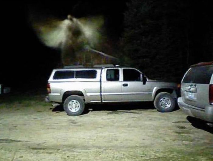 A Michigan pastor insists the figure hovering over this truck is an angel.