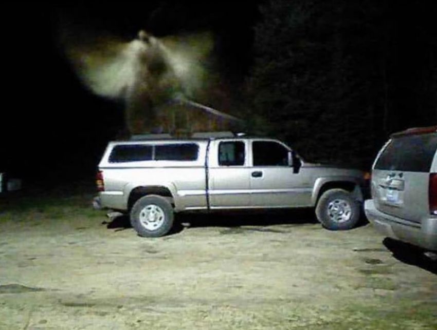 A Michigan pastor insists the figure hovering over this truck is an angel.