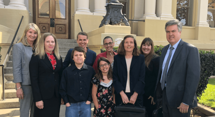Life Legal Foundation attorneys with Stephanie Packer (back row - C) and her children.