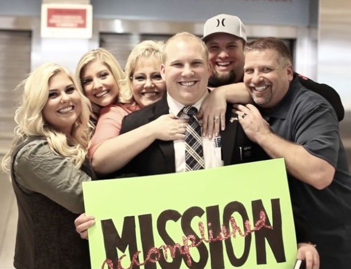 Former Mormon missionary Josh Holt (C), surrounded by his family in better days.