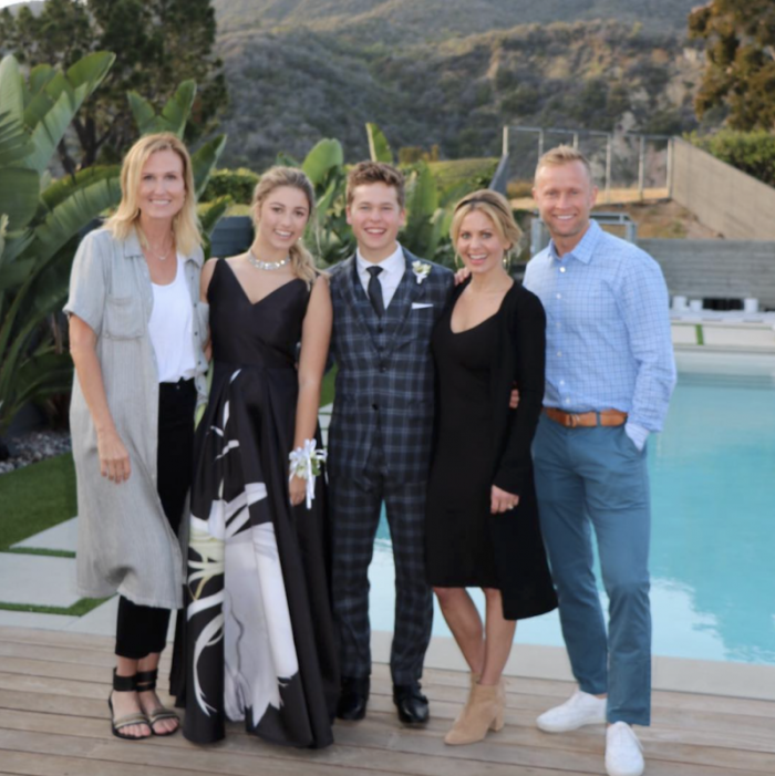 Lev Bure and Bella Robertson on their prom night with their parents Korie Robertson, Candace Cameron and Val Bure, May 20, 2018.