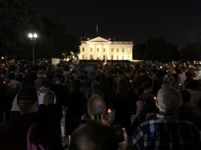 Hundreds gather for a candlelight vigil outside of the White House following a procession from National City Church in Washington, D.C. on May 24, 2018.