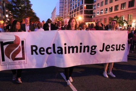 Hundreds of Christians march in a procession from the National City Church to the White House in Washington, D.C. on May 24, 2018 in response to racism, misogyny, xenophobia, and moral and political "crises" affecting political leadership.