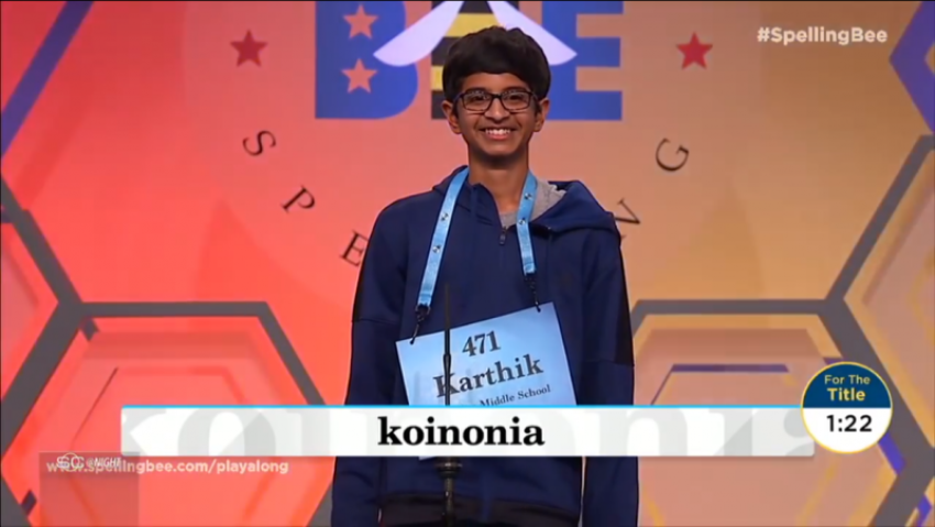 Scripps National Spelling Bee winner Karthik Nemmani, with the winning word "koinonia."