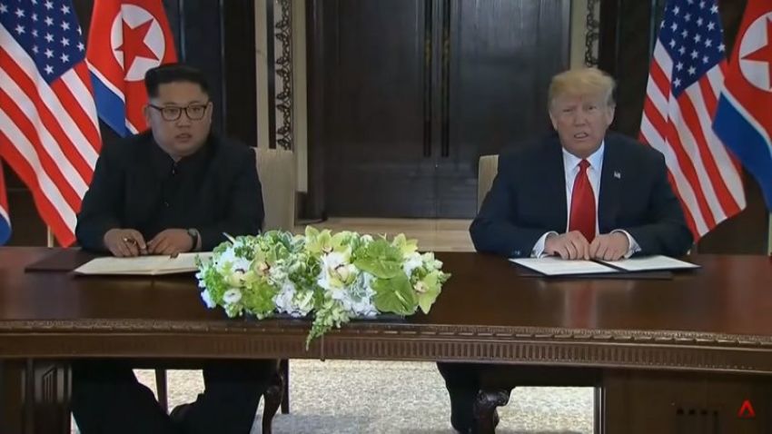U.S. President Donald Trump (R) and North Korean leader Kim Jong Un on June 12, 2018, signed a "comprehensive" document at the conclusion of the Singapore summit.
