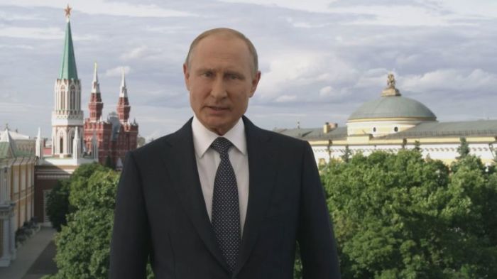 President of the Russian Federation Vladimir Putin gives a welcome address to soccer fans across the world on June 8, 2018.