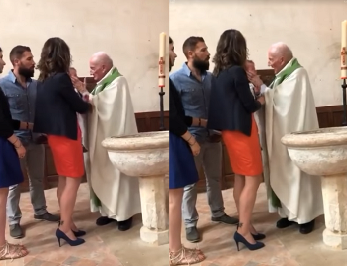 A French priest slaps a baby for crying too much during a baptism ceremony.