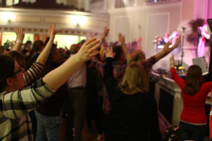 Attendees worship at Living Hope Community Church on the Isle of Man.
