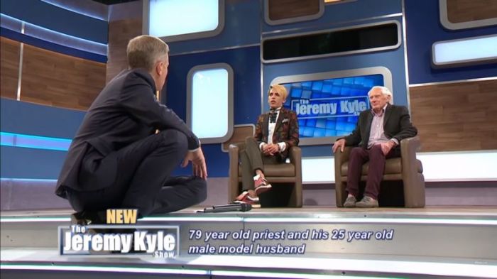 Host Jeremy Kyle (L) speaking with model Florin Marin and husband Rev. Philip Clements (R) on 'The Jeremy Kyle Show' on June 28, 2018.