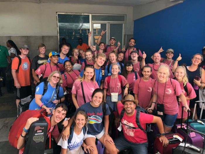 The Woodland Community Church and The Glade Church youth groups arrive at the airport in Port-au-Prince, Haiti, July 9, 2018.