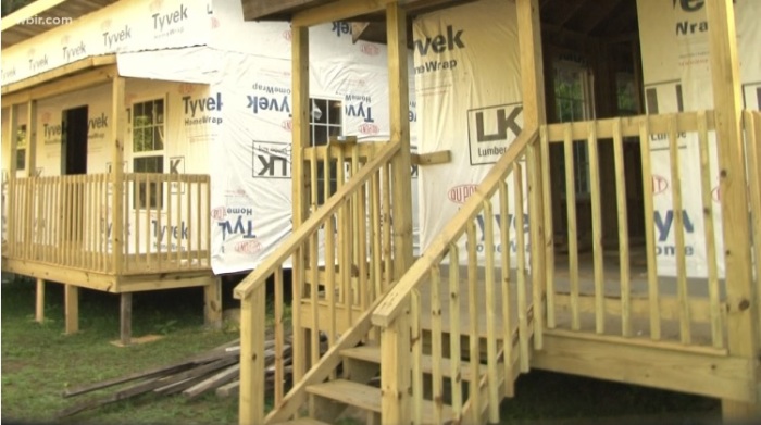 Tiny homes built by Crossroads Community Baptist Church in McCreary County, Kentucky sit as they wait to receive siding in a video that aired on WBIR in July 2018.