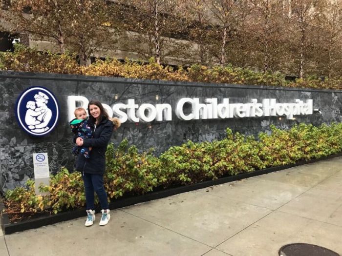 Lydia Cameron holds her son, Oliver, outside Boston Children's Hospital in Boston, Massachusetts, on November 17, 2017.