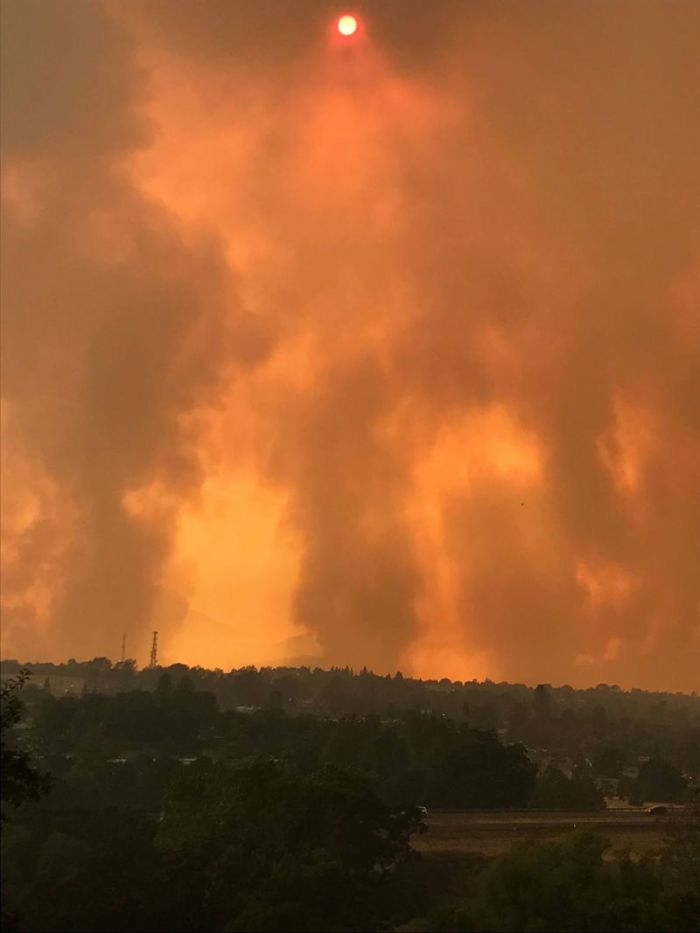 An orange horizon in west Redding, California as the Carr fire blazes across the region on July 26, 2018.