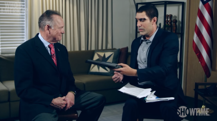 Former Alabama Supreme Court Chief Justice Roy Moore (left) prank interviewed by comedian Sacha Baron Cohen (right) for the Showtime program 'Who is America?' July 29, 2018.