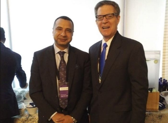 Rev. Majed El Shafie poses for a photo with U.S. Ambassador at-Large for International Religious Freedom Sam Brownback during the Ministerial to Advance Religious Freedom at the Harry S. Truman Building in Washington, D.C. on July 24, 2018.