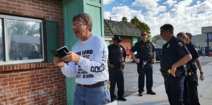 Pro-life activist Calvin Zastrow reading from a Bible and preaching across the street from an abortion clinic in Toledo, Ohio, on Oct. 3, 2017.