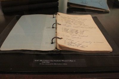 Billy Graham's notebook from Wheaton College sits on display at the Museum of the Bible in Washington, D.C. on Aug. 3, 2018.